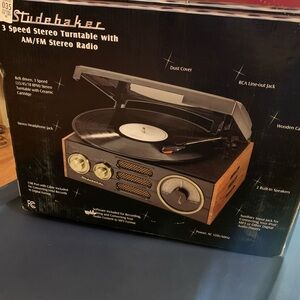 Studebaker  3 speed stereo turnatable with am/fm radio